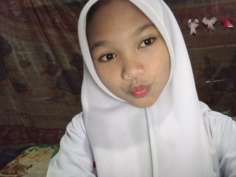 Ayu  carmila